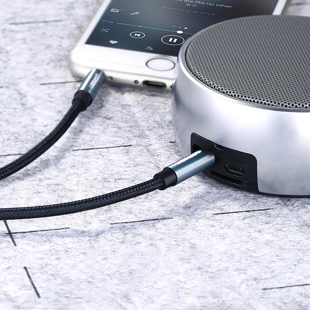 Kabel audio kątowy UGREEN AV112 AUX 2x mini jack 3,5mm 1,5m niebieski