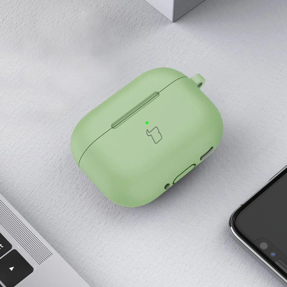 Silikonowe etui z karabińczykiem Bizon Case Headphone Silicone do Apple AirPods 4 jasnozielone