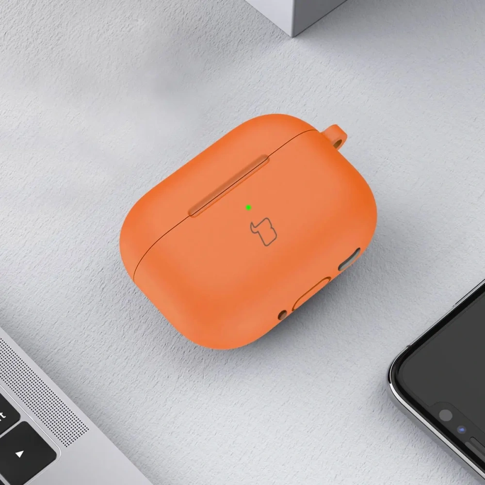Silikonowe etui z karabińczykiem Bizon Case Headphone Silicone do Apple AirPods 4 pomarańczowe