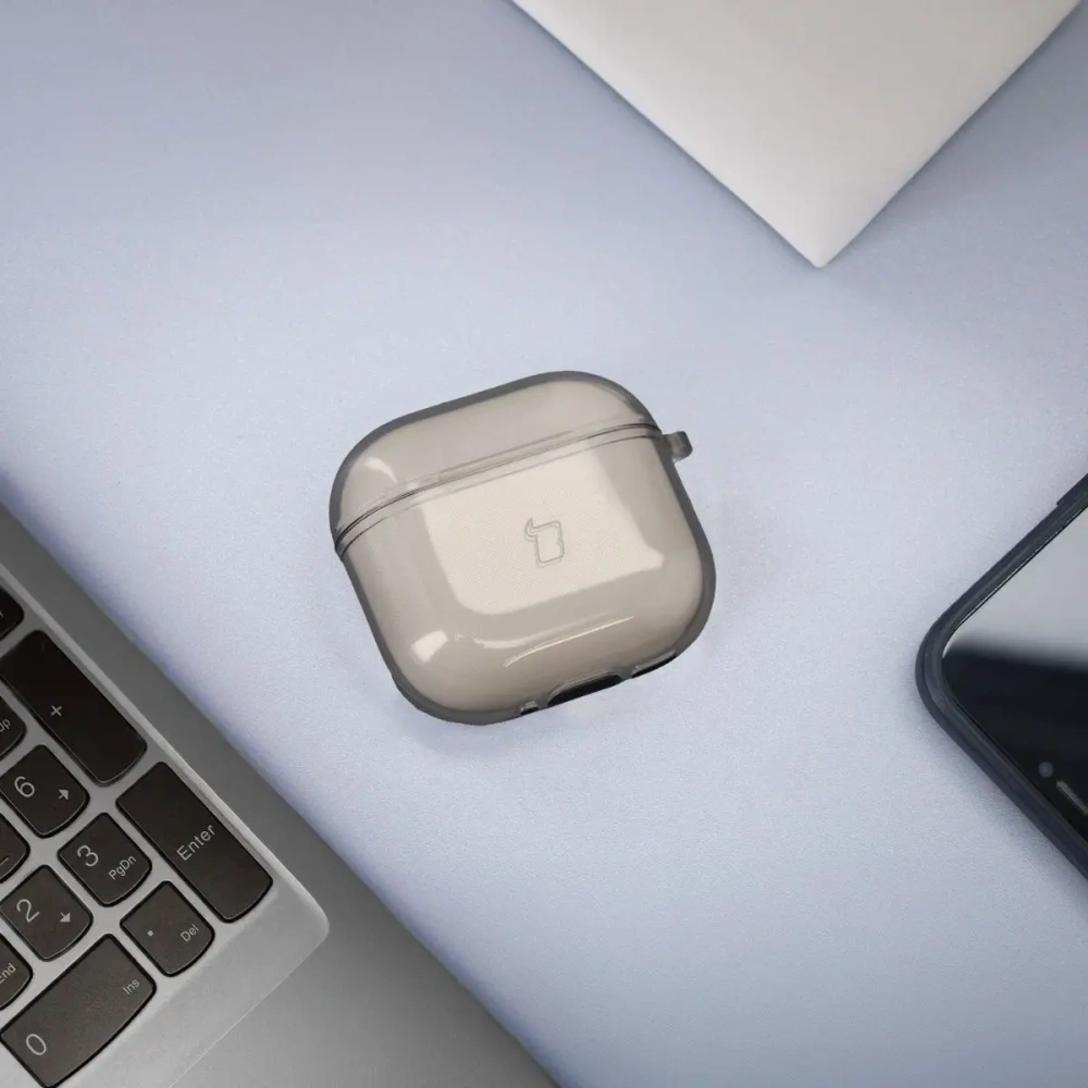 Elastyczne etui z karabińczykiem Bizon Case Headphone Clear do Apple AirPods 4 przezroczysto-czarne