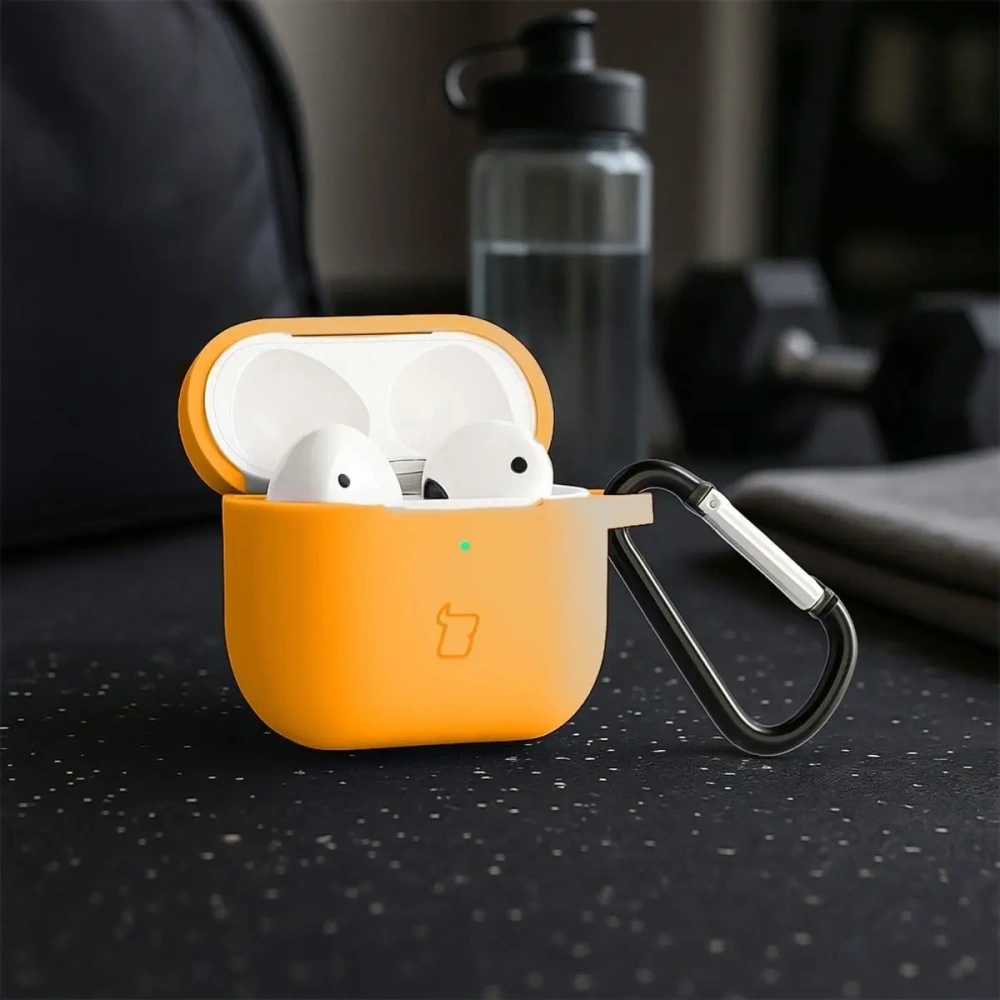 Silikonowe etui z karabińczykiem Bizon Case Headphone Silicone do Apple AirPods 3 marchewkowe