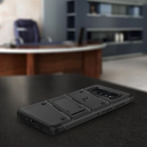 Kup Páncélozott tok Zizo Bolt Cover Samsung Galaxy S10+ Plus és állvány & övcsat (Fekete/Fekete) - ZIZ003BLK - {ean13} - Sklep Home Screen