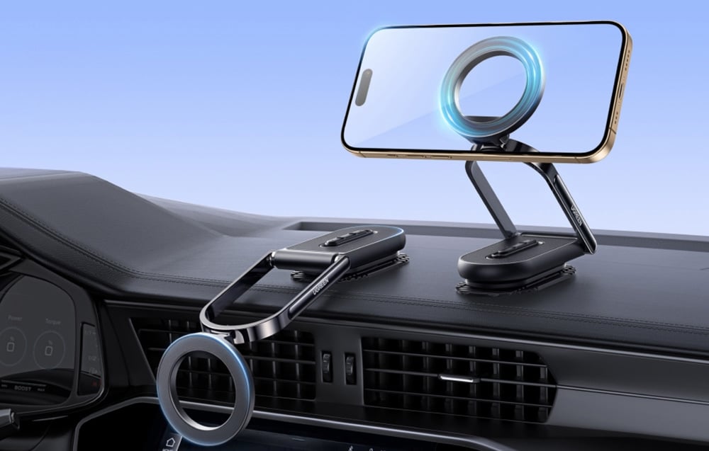 uchwyt magnetyczny ugreen zamocowany na desce rozdzielczej w dwóch pozycjach. jeden z nich trzyma telefon