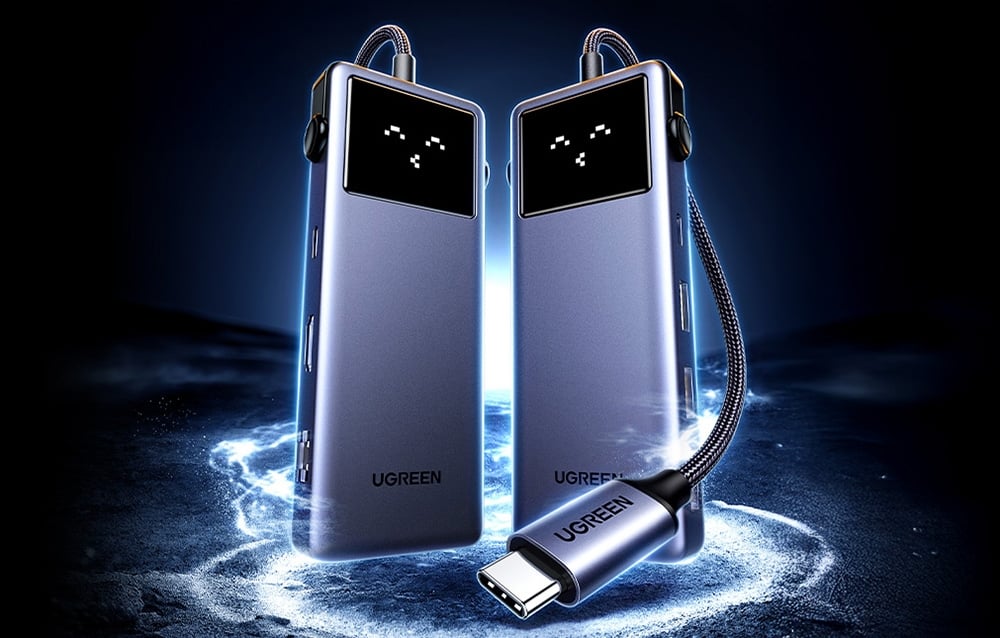 Dwa huby UGREEN z wyświetlaczami LED pokazującymi emotikony, ustawione pionowo na podświetlonym tle.