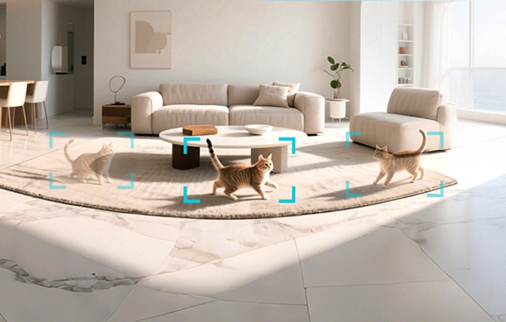 Nowoczesny salon z trzema kotami oznaczonymi niebieskimi ramkami wykrywania ruchu