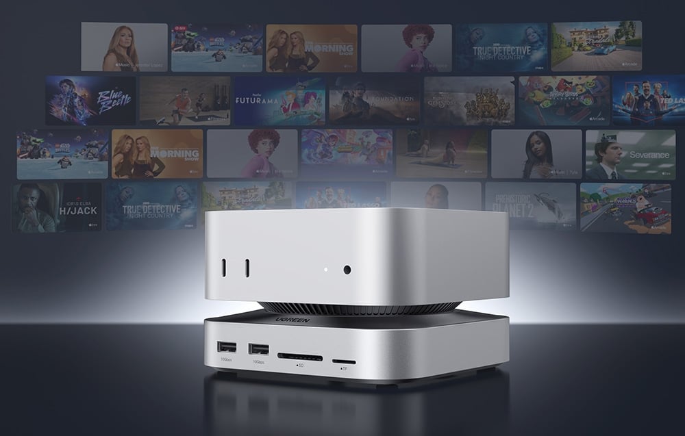 UGREEN docking station under a Mac computer with thumbnails of popular movies and series displayed
