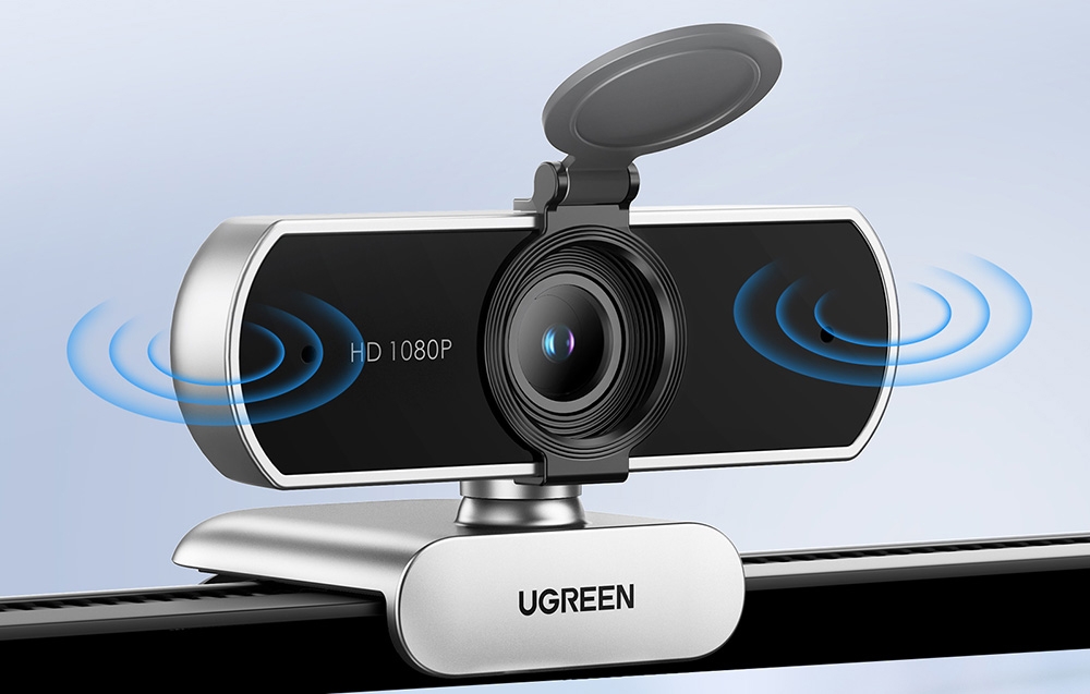 Webcam with graphic sound waves showing audio function on a bright background