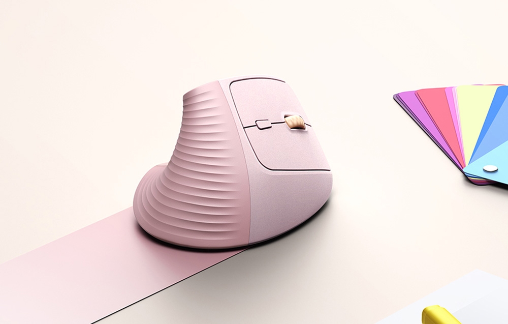 Różowa myszka UGREEN na pastelowym tle obok wzornika kolorów