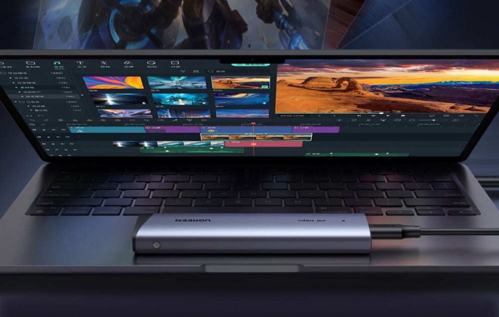 UGREEN SSD lying on a laptop with open video editing software