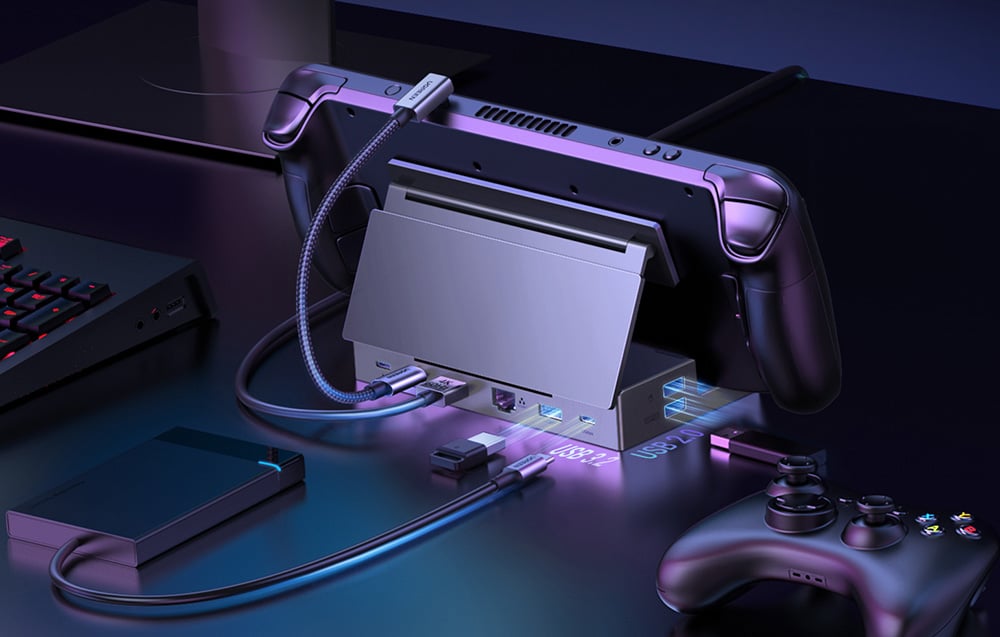 Adapter Ugreen CM800 podłączony do różnych urządzeń elektronicznych.