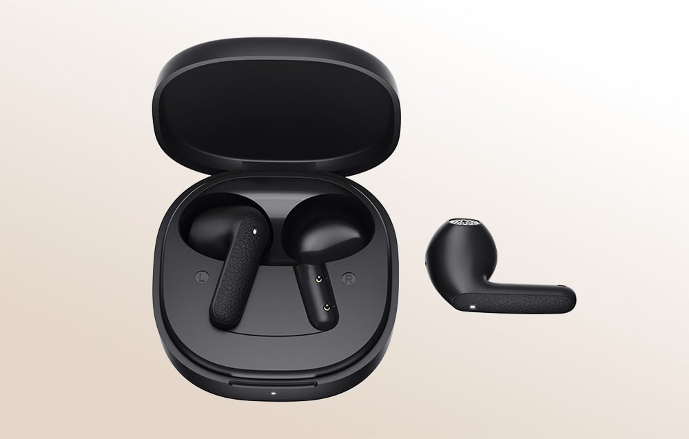 Black case with one earphone, the other earphone lies beside it.