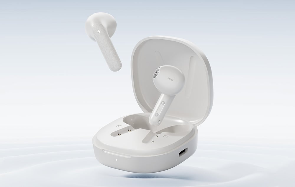 White wireless headphones above the charging case.