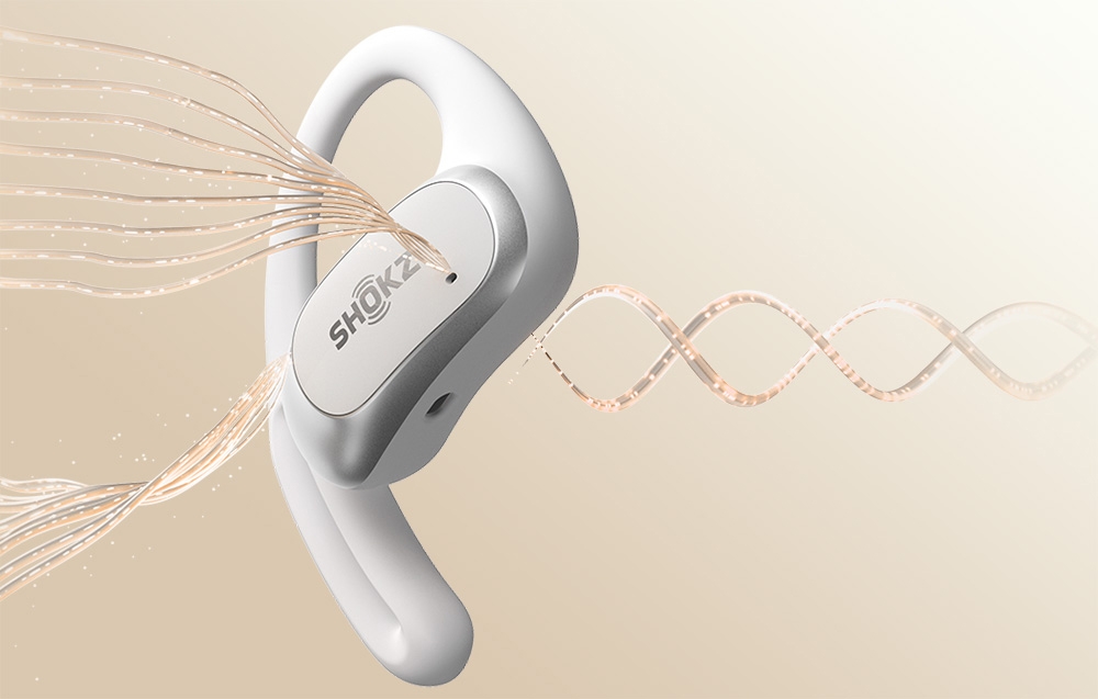 Fale dźwięku przechodzące przez białą słuchawkę bezprzewodową na złotym tle