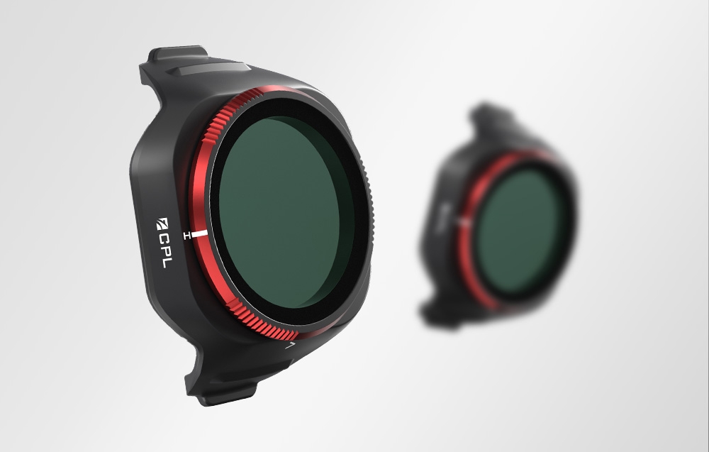 CPL filter for drone with a red border and dark green polarizing glass in the foreground with a blurred background