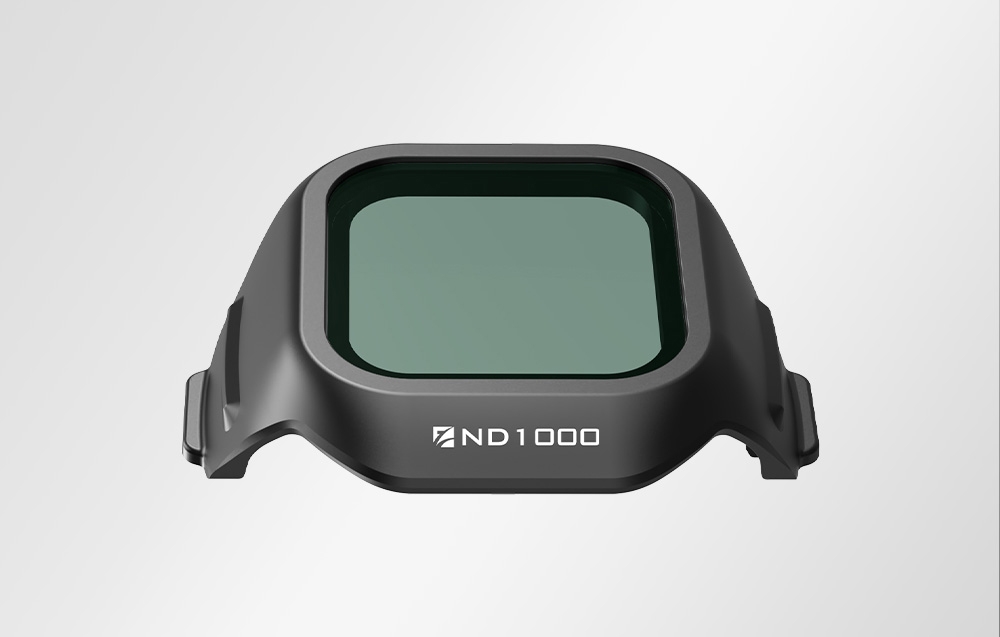 Top view of ND1000 filter for drone with mint optical glass in black frame on white background