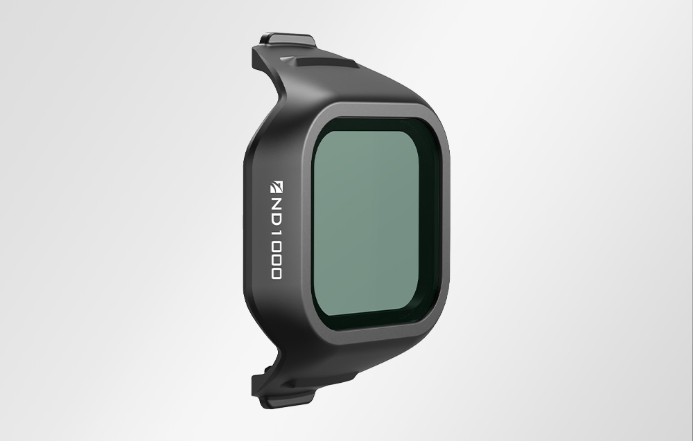 ND1000 filter with mint glass in black frame viewed from the side on a light background - professional filter for drone