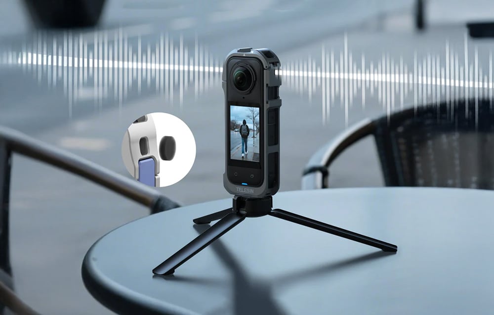Sportkamera im Gehäuse Telesin und am Stativ befestigt liegt auf einem Tisch