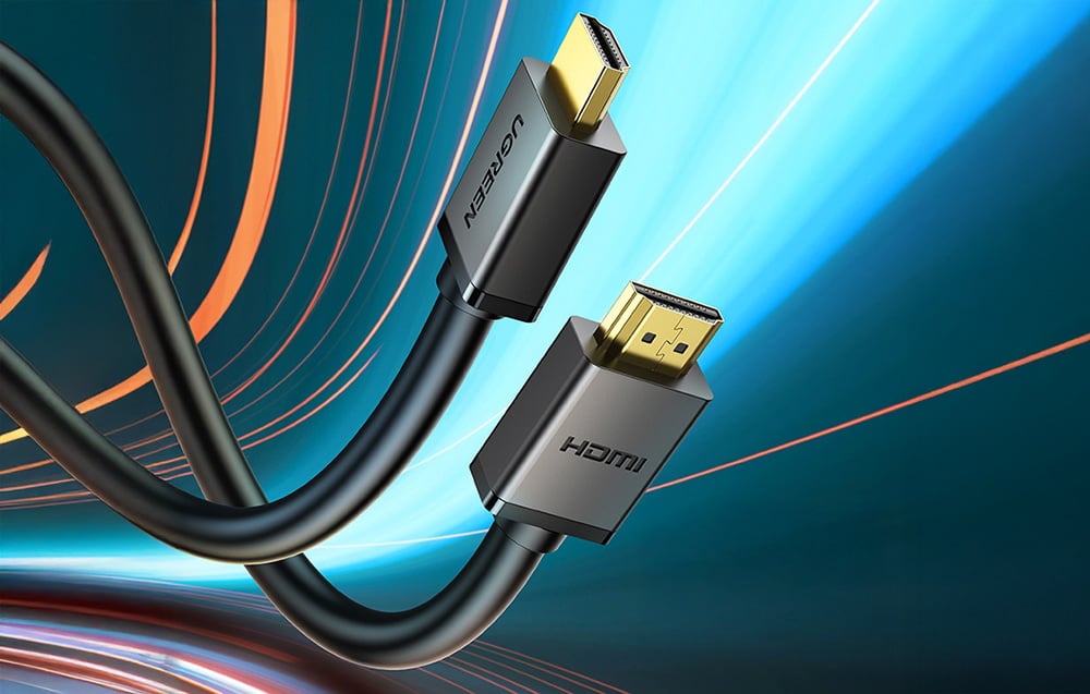 dwa czarne kable HDMI na kolorowym tle