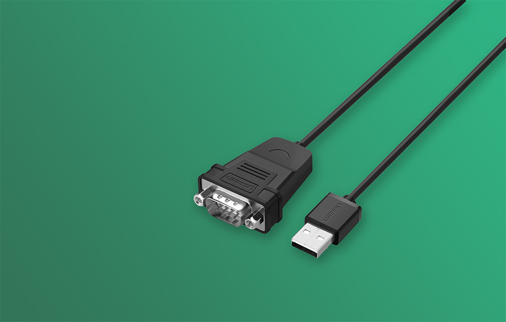 Kabel Ugreen USB do DB9 na zielonym tle