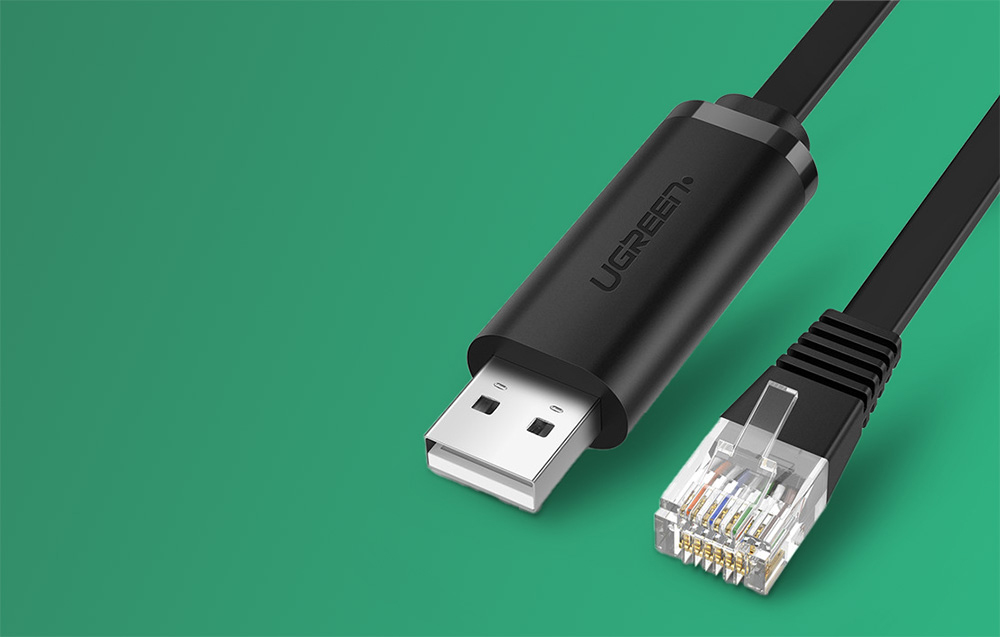 czarny kabel konsolowy na zielonym tle