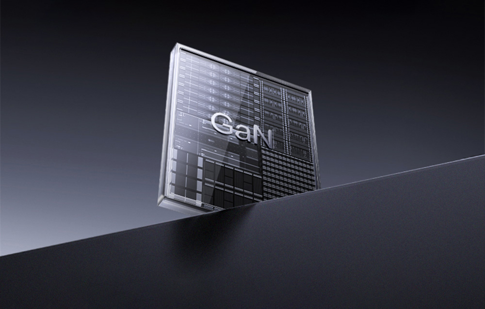 Przezroczysty moduł z napisem „GaN” przedstawiający wizualizację technologii układu elektronicznego.
