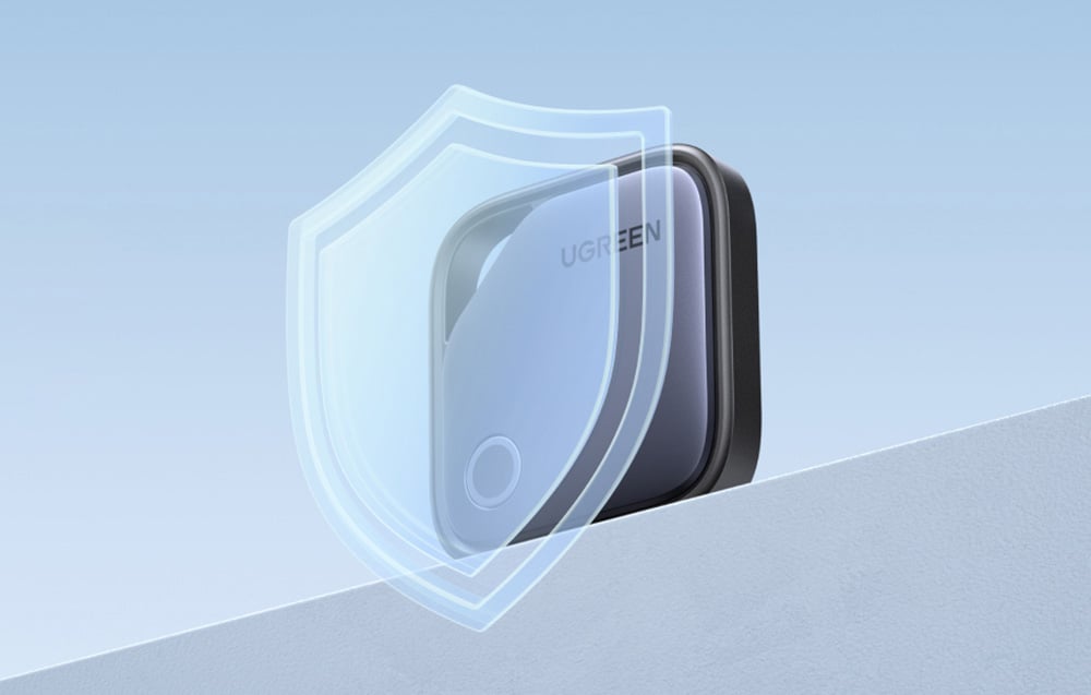 Lokalizator UGREEN przedstawiony z graficzną ikoną tarczy symbolizującą ochronę lub bezpieczeństwo.