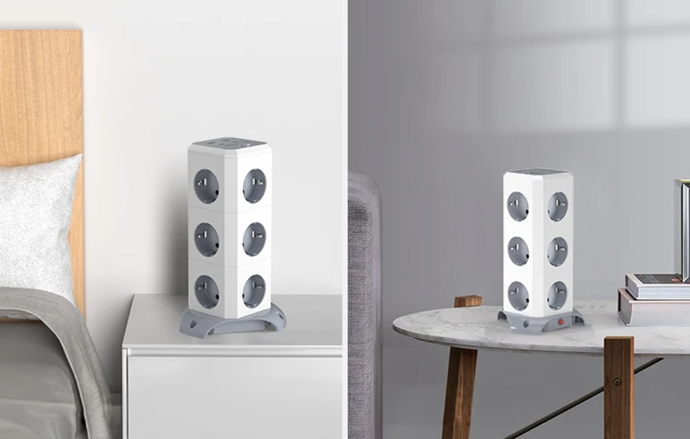 Power strip placed on a nightstand, with a table next to it holding books