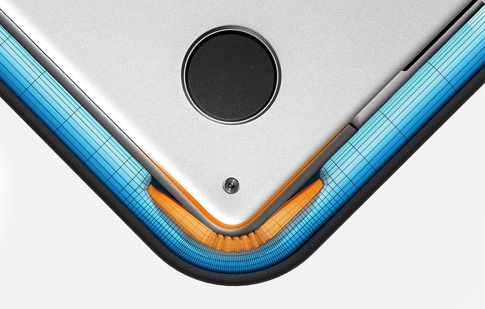 Zbliżenie na róg laptopa z grafiką siatki 3D, pomarańczowymi i błękitnymi elementami, śrubą i gumą