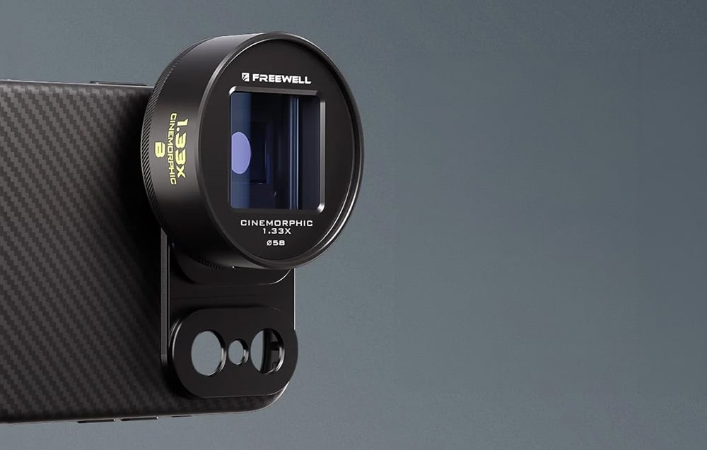 Anamorphic lens on a smartphone with an attached round ND filter to darken the light.
