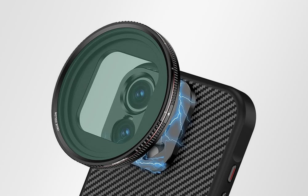 iPhone in a carbon-pattern case with a large, dark photographic filter magnetically mounted.