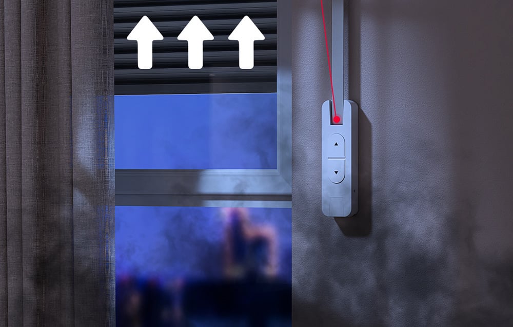 Intelligent roller shade motor in a dark room next to a window with the shade drawn up