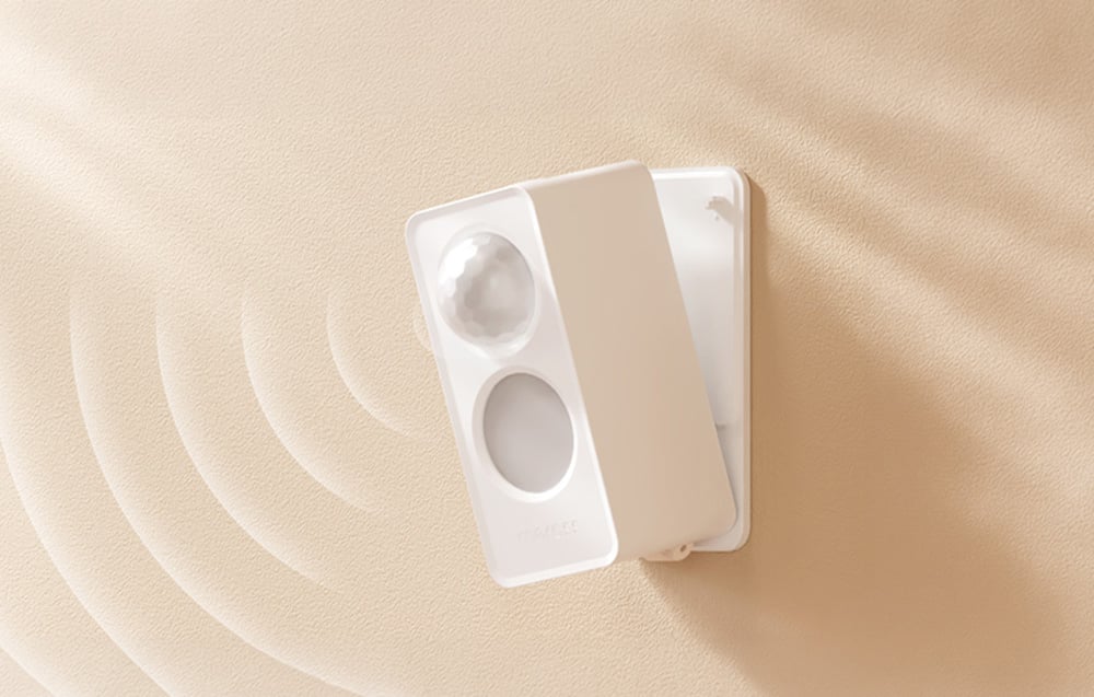 Intelligent presence sensor mounted on a light wall