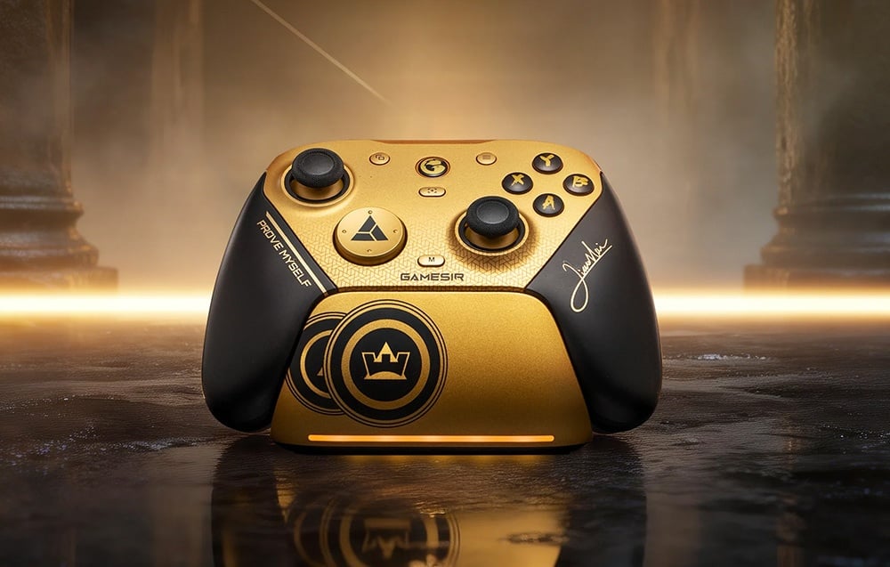 Black-gold game controller set on a docking station with lighting and a dark background