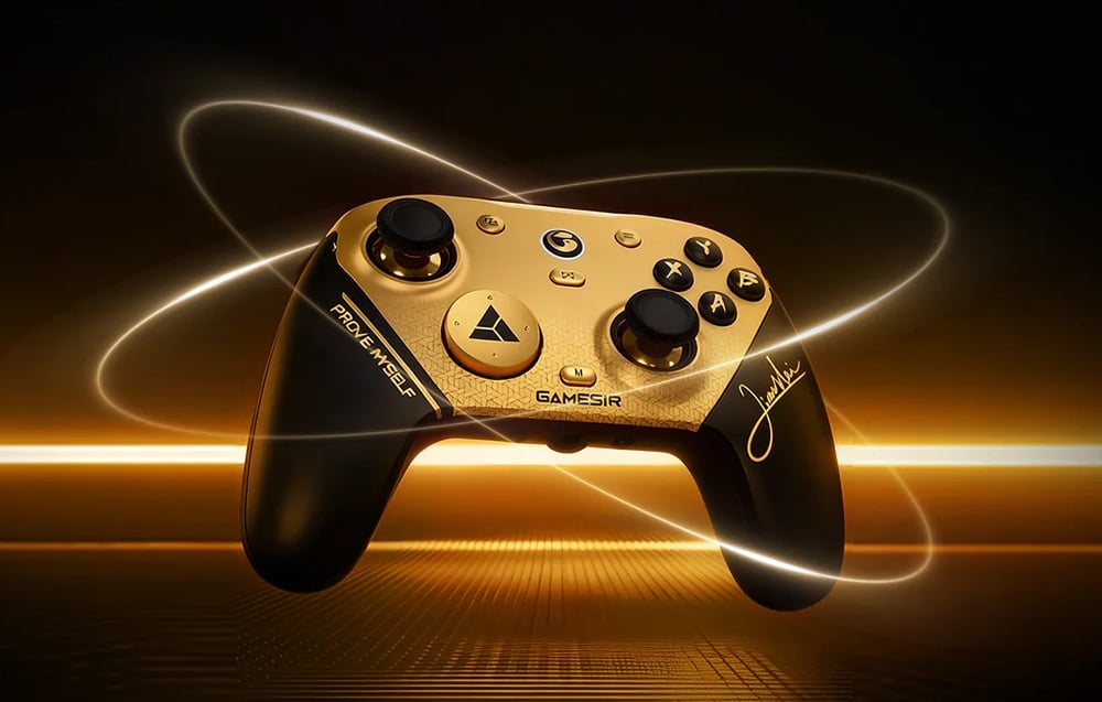 Black-gold game controller on a dark background with light effects around the device