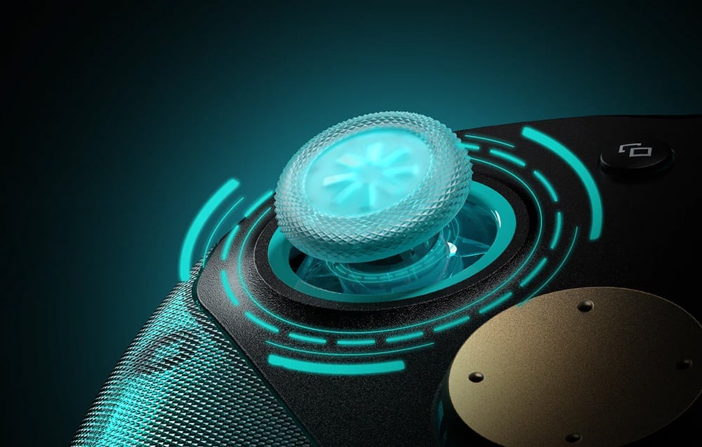 Close-up of the analog joystick of the controller with illuminated graphics around the stick