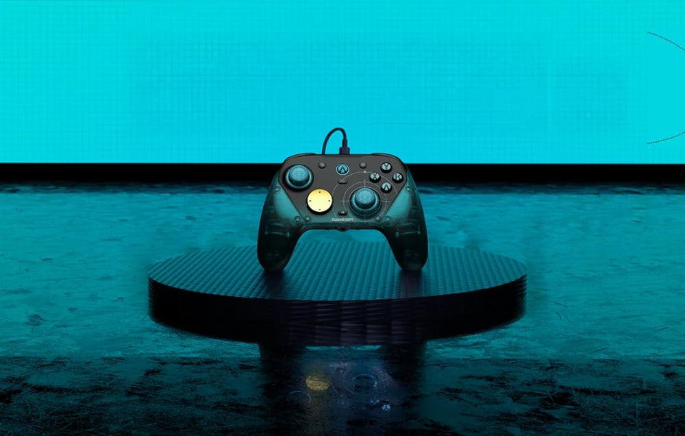 Game controller centrally positioned on a round platform with turquoise backlighting in the background