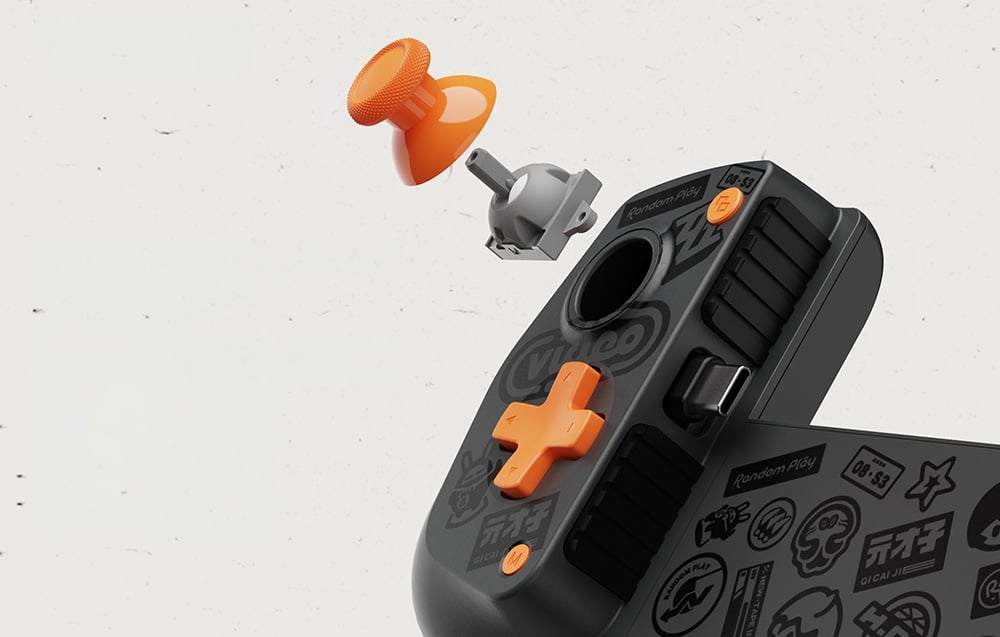 Widok eksplodowany modułu analogowego joysticka nad obudową kontrolera do smartfona z odsłoniętym mechanizmem mocowania