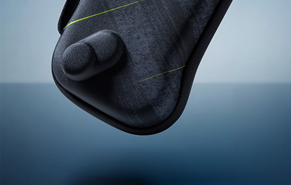 Close-up of the rounded corner of the case with a contoured shape fitting the joystick.
