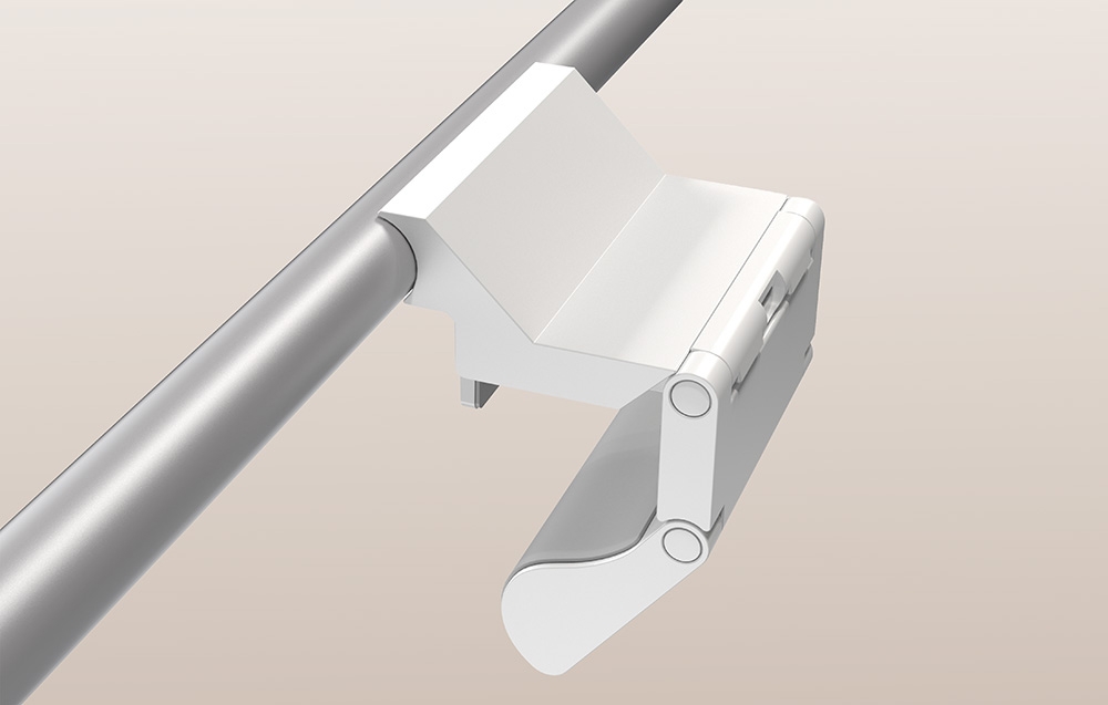 Detail of the white holder of the Yeelight lamp mounted on the silver tube of the monitor, showing the construction