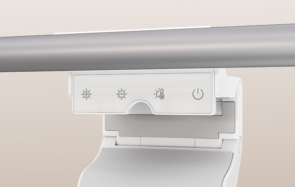 View of the touch panel of the Yeelight lamp with white icons for power, brightness, and color temperature