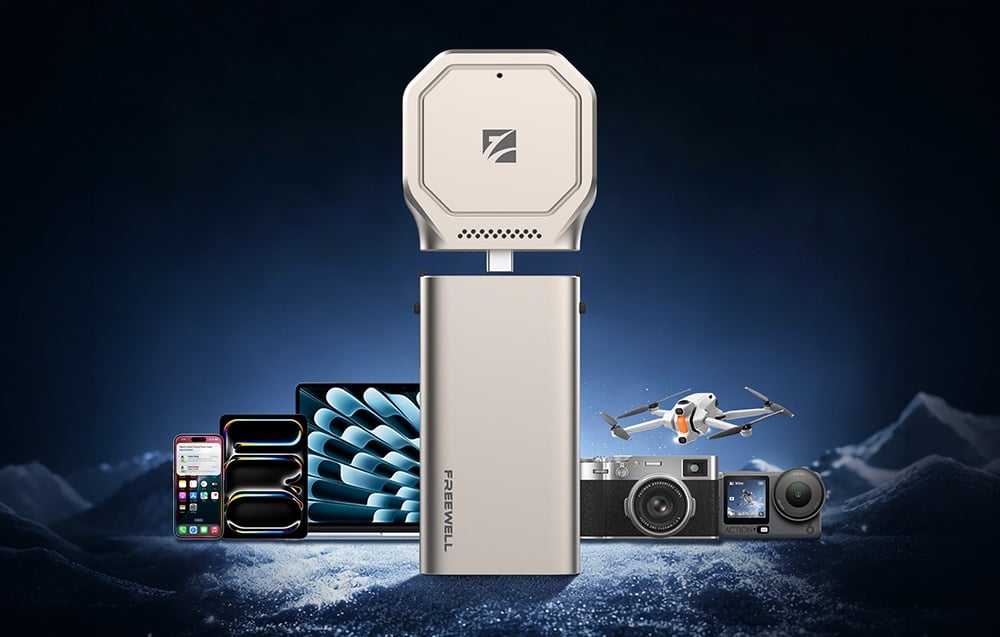 Czytnik i adapter Freewell ze smartfonami, tabletem, aparatem i dronem na tle ośnieżonych gór w nocy
