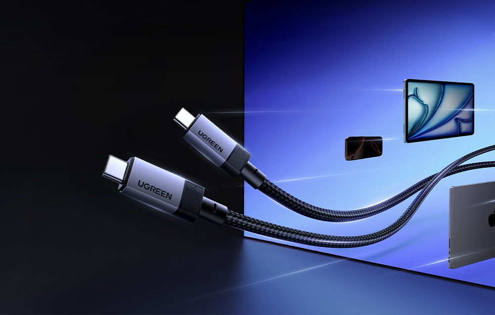 Kabel USB-C Ugreen w czarnym oplocie przedstawiony na tle laptopa, tabletu i telefonu