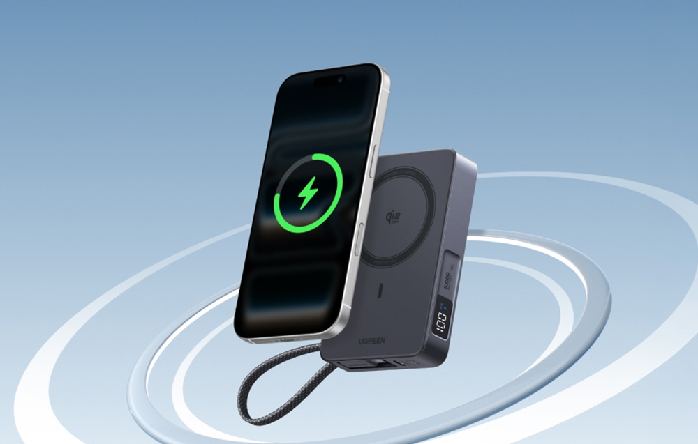 Gray Ugreen Qi2 wireless power bank with built-in cable and attached iPhone smartphone
