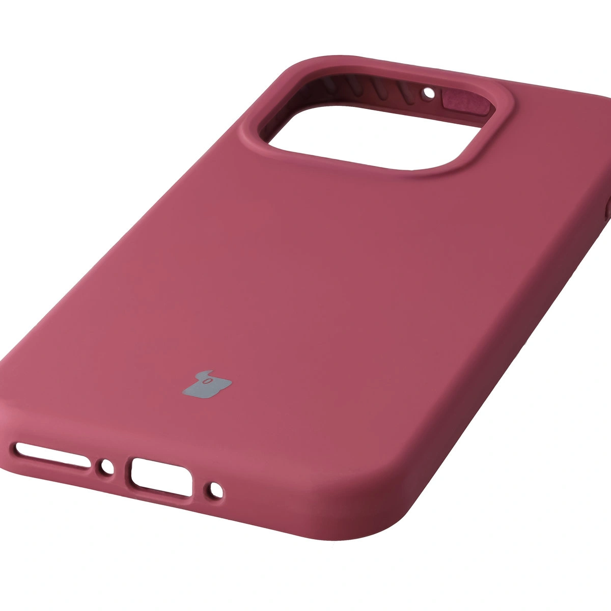 Close-up of precise cutouts and wireless charging capability in the Bizon Soft Case for OnePlus 15