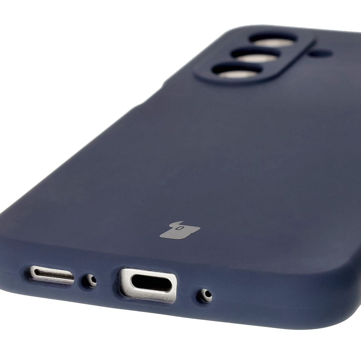 Close-up of precise cutouts and wireless charging capability in Bison Soft Case