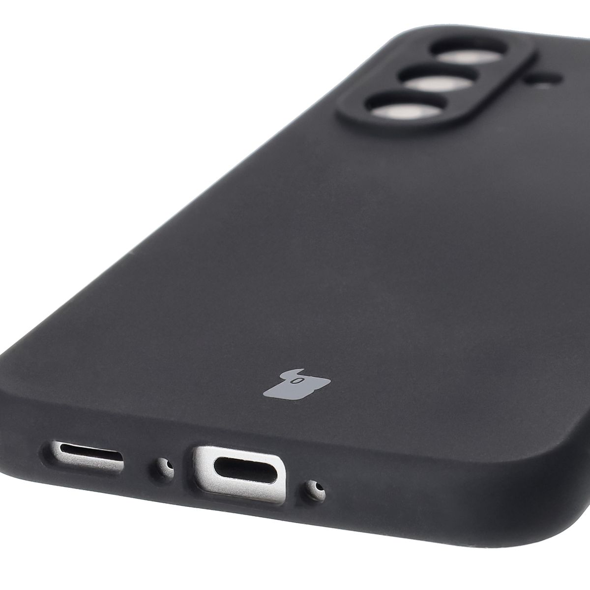 Close-up of precise cutouts and wireless charging capability in Bison Soft Case
