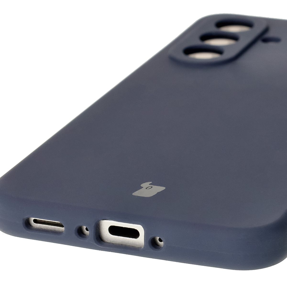 Close-up of precise cutouts and wireless charging capability in the Bison Soft Case