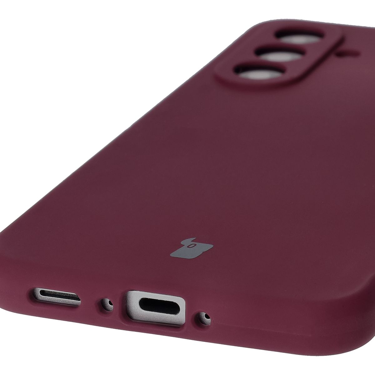 Close-up of precise cutouts and wireless charging capability in Bison Soft Case