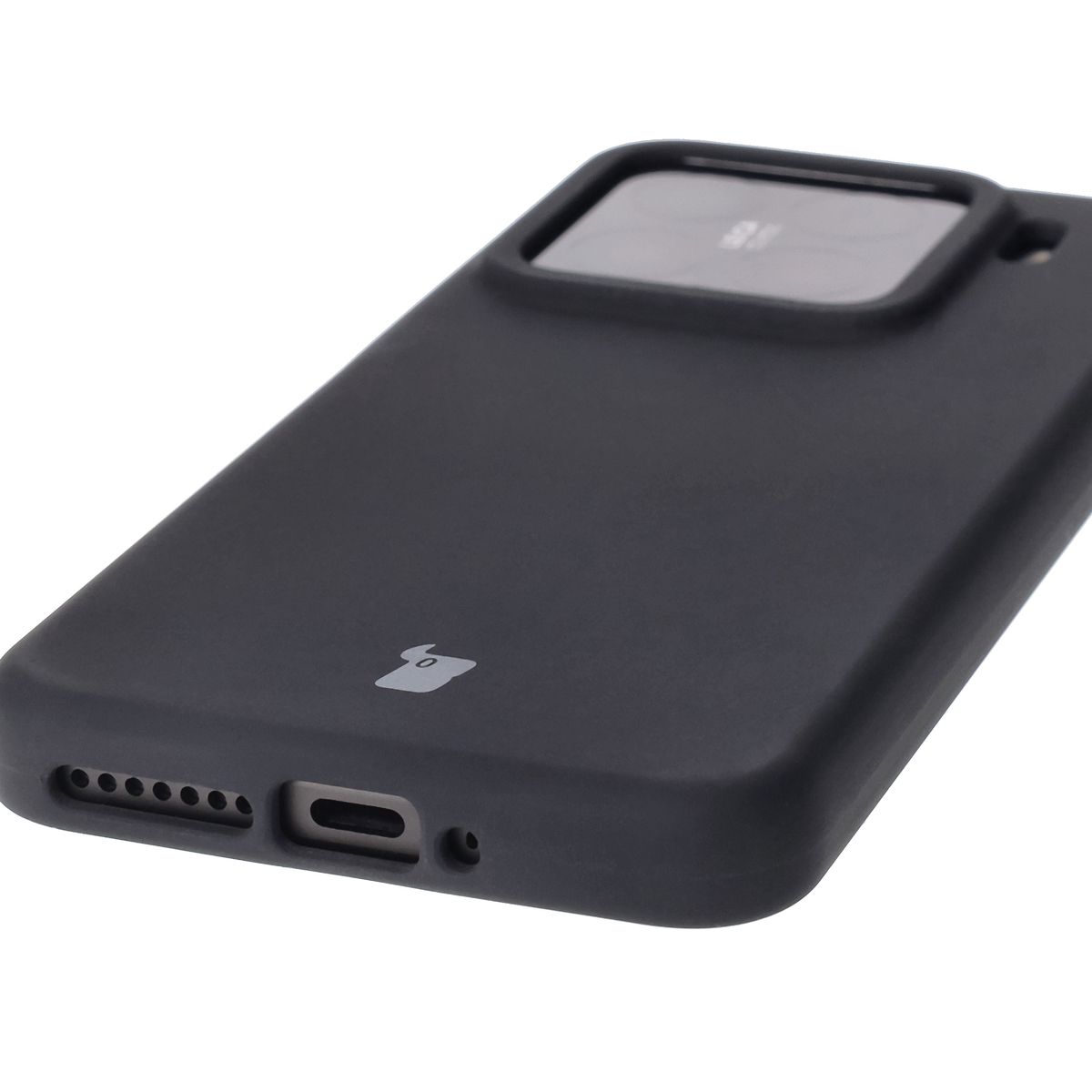 Close-up of precise cutouts and wireless charging capability in Bison Soft Case