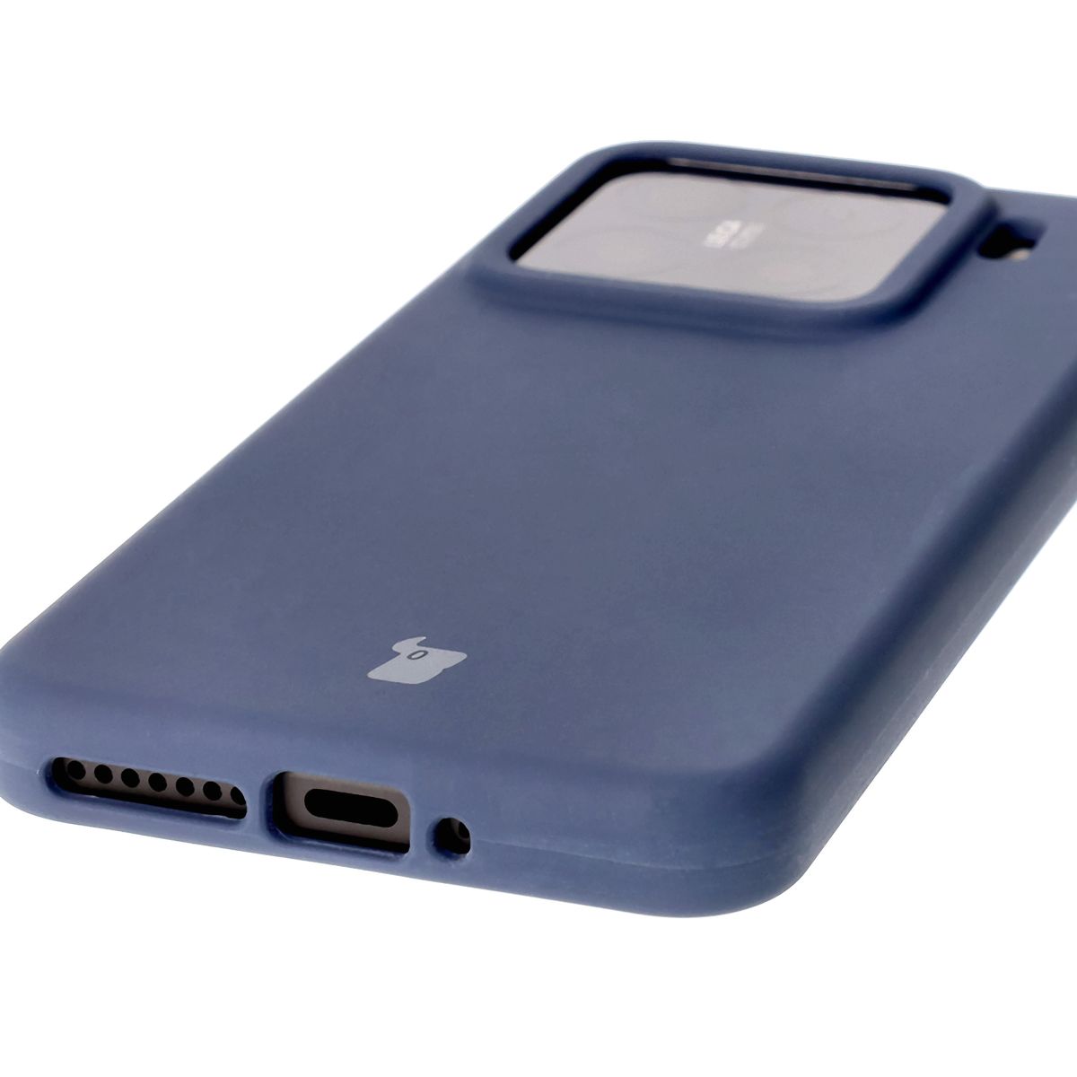 Close-up of precise cutouts and wireless charging capability in Bison Soft Case